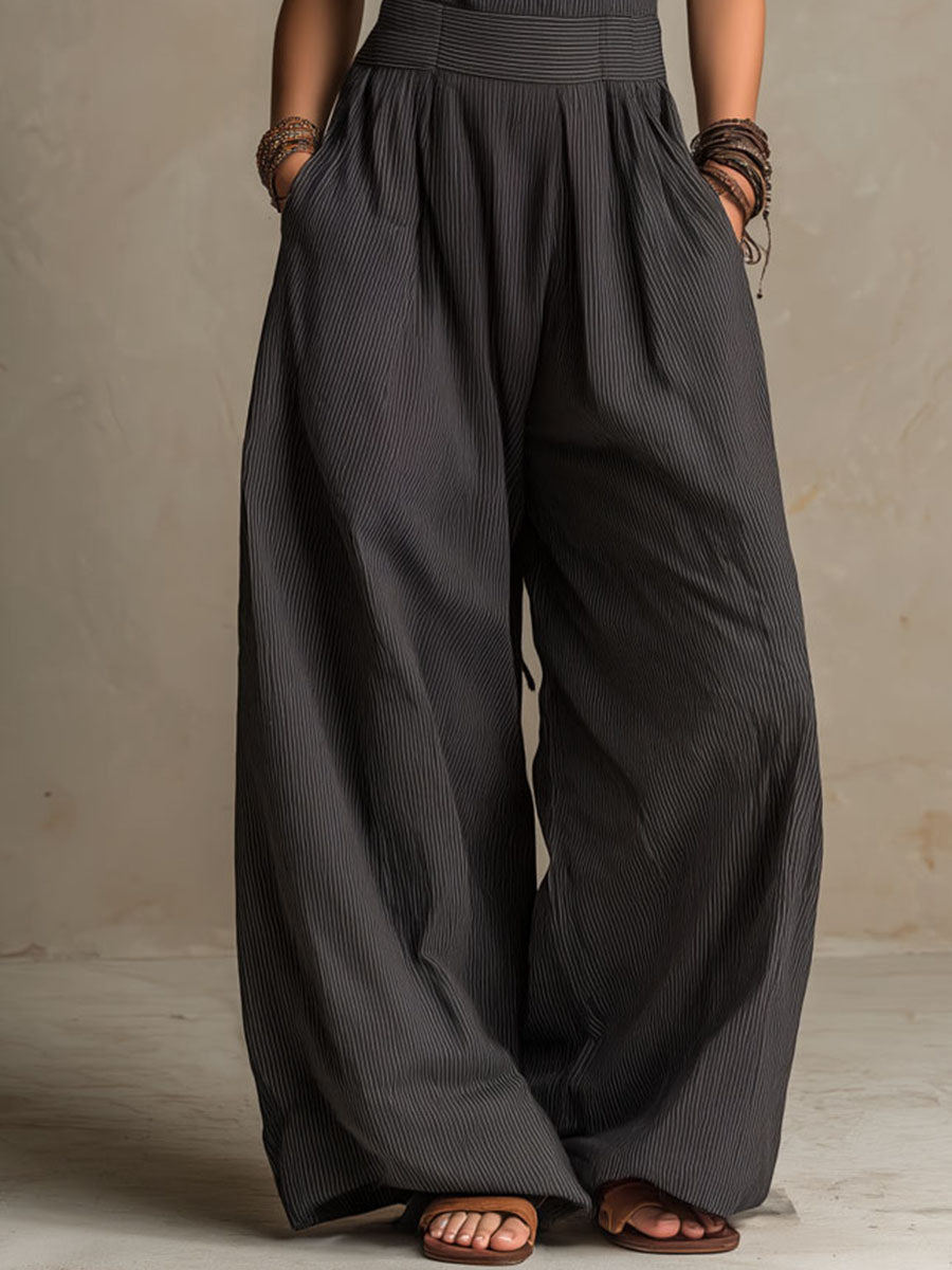 Mono Boho Gris Carbón de Pierna Ancha con Rayas Diplomáticas y Cuello Halter Cruzado