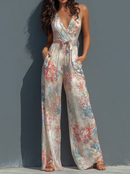 Mono Boho Resort de Satén Floral con Cuello Halter, Diseño Cruzado y Pierna Ancha