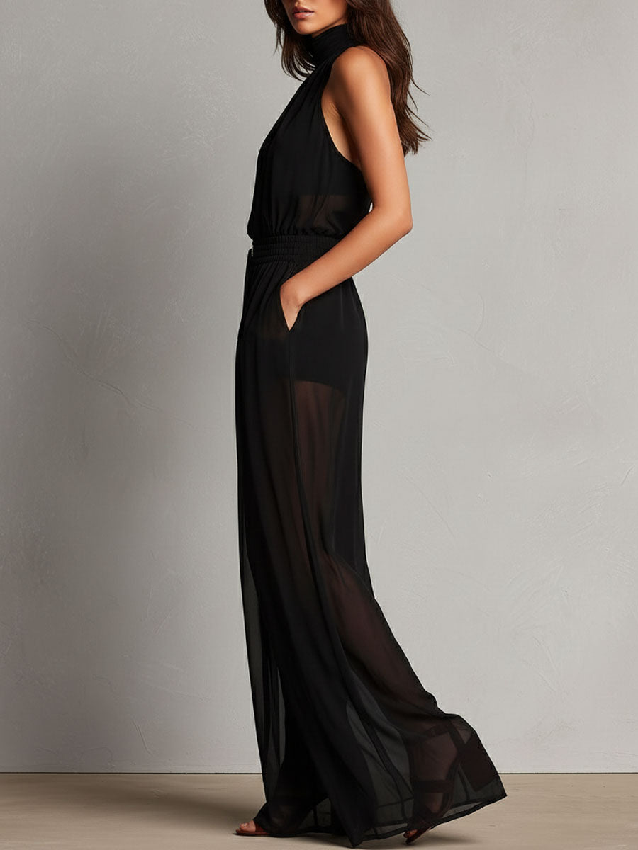 Mono Elegante Negro de Pierna Ancha con Cuello Halter Alto y Detalles Semitransparentes