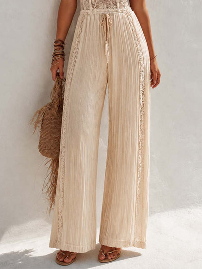 Mono Bohemio Crema con Corsé de Encaje y Pantalón Plisado de Pierna Ancha