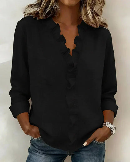 Irene | Blusa con volantes, escote en V y mangas largas