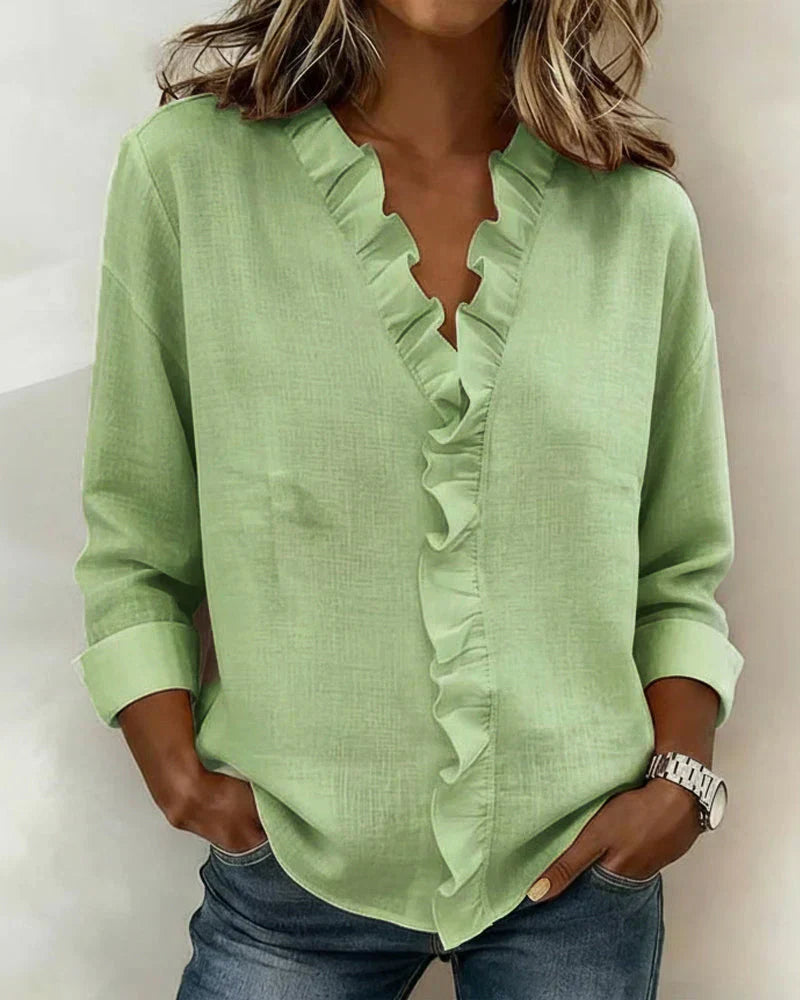 Irene | Blusa con volantes, escote en V y mangas largas