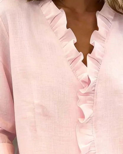 Irene | Blusa con volantes, escote en V y mangas largas