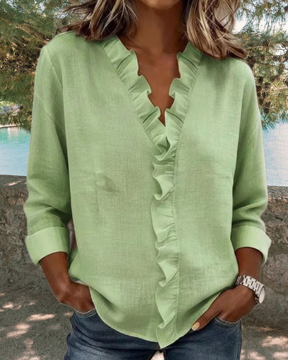 Chiara | Blusa con escote en V y delicados volantes