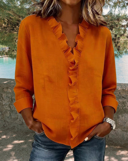 Chiara | Blusa con escote en V y delicados volantes
