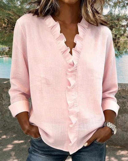 Chiara | Blusa con escote en V y delicados volantes