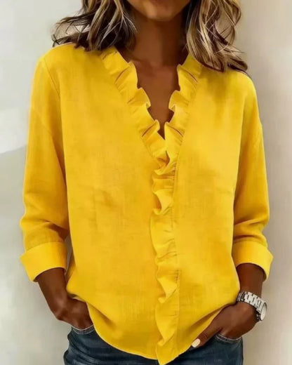 Irene | Blusa con volantes, escote en V y mangas largas