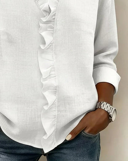 Irene | Blusa con volantes, escote en V y mangas largas
