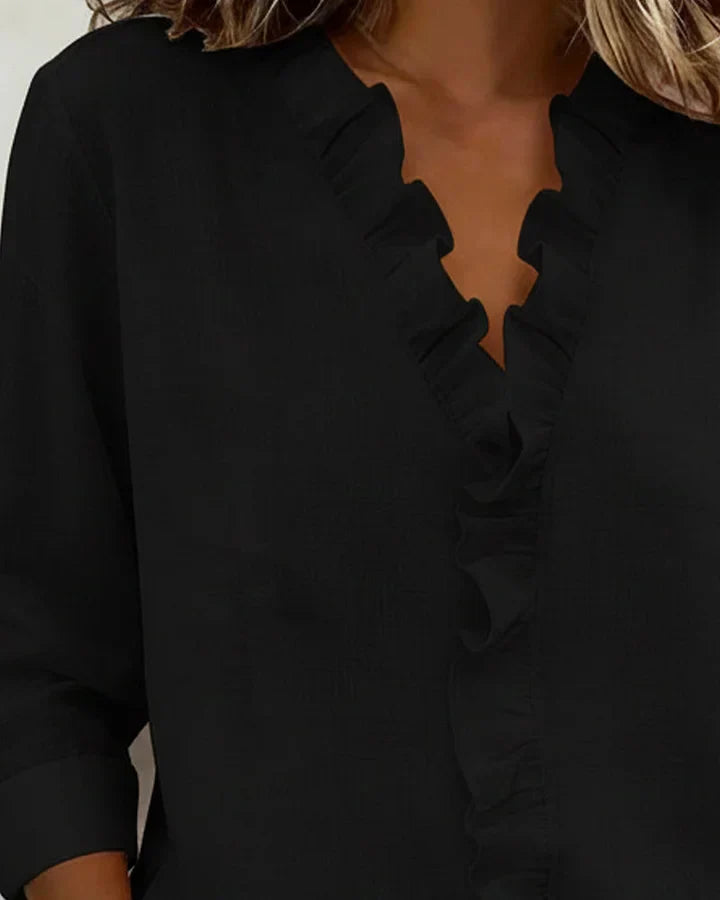 Irene | Blusa con volantes, escote en V y mangas largas
